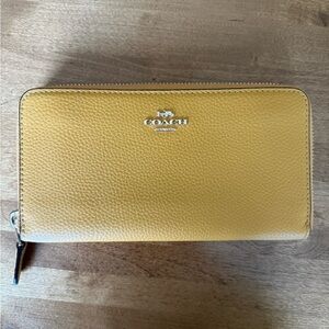 Coach Mustard Yellow Pebbled Leather Zip Wallet with Silver Logo